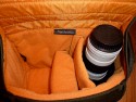 CRUMPLER MUFFIN TOP 5500\n\nFoto von Robert Mayr - VIELEN DANK!\n\nKommentar:\n\nvorab, es handelt sich um eine Crumpler Muffin Top 5500 in olive/orange die mit folgendem bestckt wird:\n- Canon 400D + BG-E3\n- Tamron 17-50 2.8 mit umgedreht angesetzter Geli\n- Canon 50 1.8 II\n- Canon 70-200 4.0 L mit umgedreht angesetzter Geli