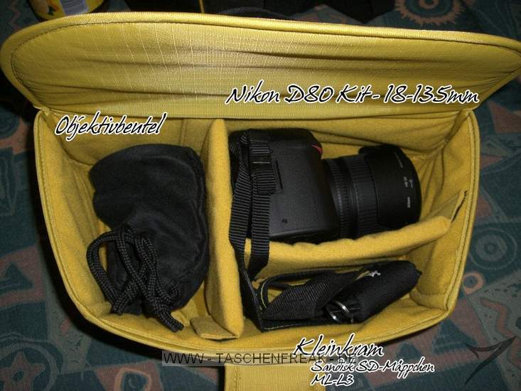 CRUMPLER NIKON THIS (CF-EU03)\n\nFoto von Johannes David Ganzenmller - VIELEN DANK!\n\nKommentar des Nutzers:\n\nHallo,\nerstmal ein dickes Lob fr die Seite und nun kurz zu den Bildern:\n\n1. Bild:\nStandardaufteilung der inneren "Fotobox", mit Nokia 6230i als Grenvergleich\n\n2.Bild:\nKleine Testaufteilung um das Packvolumen zu verdeutlichen, leider hab ich noch kein zweites Objektiv, daher hab ich nur mal den Beutel vom Kit reingelegt. Es ist aber Platz fr ein greres Objektiv oder einen Blitz.\n\n3.Bild:\nRucksack mit ausgebauter Fotobox und zum Vergleich eine 1,5l Flasche daneben\n\n4.Bild:\nDer Rucksack von hinten. Es ist eine Seitentasche erkennbar, in die man zB weiteres Kleinkram oder ein Handy packen kann. Zudem sieht man, das der Reiverschlu bis nach fast ganz unten geht um so leichter an die am Boden befindende Fotobox zu gelangen.\n\n5.Bild:\nDer geffnete Rucksack von vorne (man sieht unten die Fotobox)\n\nMfG\nJohannes David Ganzenmller