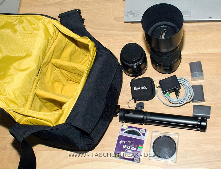 CRUMPLER THE THAT\n\nFoto von Rayko Menzel\n\nKommentar des Nutzers:\n\nHier eine neue Tasche fr euch:\n \nCrumpler The That Schultertasche.\n \nDa passt eine SLR mit BG und aufgesetzem Objektiv, sowie zwei zustzliche Objektive (oder statt eines Objektives ein Blitz) rein, bis zu einer Objektivlnge von etwa 25 cm.\n\nUnd Kleinkram halt, siehe Bilder.\n \nGru\n \nRayko\nwww.hatschie.de
