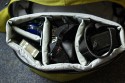 CRUMPLER - WARM SHOWER\n\nFoto und Text von Choirul Huda - VIELEN DANK!\n\nKommentar:\n\nHeute ist endlich mein Crumpler Warm Shower in der Farbe "Dark Grau  /Grau Army "  angekommen  danach mache ich gleich mal ein paar Bilder, \n\nDer Rucksack bietet reichlich platz fr ein bis zwei Kamera Bodys und Objektive sowie weiteres Zubehr. In bereich Fototasche (unter) kann man Zwei bodies und mit Kit Lens sowie Baterrie und Blizt reinpassen. Die Taschepolster kann herausgenommen werden, sodass die Tasche kann als allgemeine Tages Daypack benutzt werden. Die herausnehmbare Fototasche im inneren des Rucksackes ist ca. 34x48x15,5 cm gro.\n\nBeim Laptop bereich (hinter) gibt es doch eine Laptop Tasche und kleine Raum fuer ein paar Buch zu verstauen.  \n\nDer Rucksack hat laut Crumpler die Ma?e 35x54x25 cm und das Laptopfach reicht fr Laptops bis ca. 15 Zoll ( Wide ). Mit Laptop im Deckel passt er ca. 15 Zoll an und das aber finde ich sehr eng, trotzdem auf lngeren Touren absolut nicht ratsam...\n\nDer Rucksack ist zum Rcken hin extrem gut gepolstert und erhht durch einen zustzlichen Brust-, und Bauchgurt den Tragekomfort, auch bei schwerer Beladung, erheblich.\n\nAn den unteren Ecken sind (rechts sowie linksseitig) zwei kleine Taschen, wo z.B. das Handy oder ein MP3 Player Problemlos ihren Platz finden. Eine Kabelfhrung fr die Kopfhrer hat auch beim Crumpler  mit an den Trageriemen anzubringen.\n\nEs sind noch zwei weitere von au?en zu ffnende Fcher an dem Rucksack, die reichlich Stauraum bieten. Das groe Fach bietet ausreichend Platz fr Akkus, Speicherkarten und Schreibutensilien.\n\nDer Rucksack ist in den Farben "Ziegelrot /Weiss", "Dark grau/ Army Grau", "Weiss Grey / Grau" erhltlich.