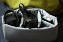 CRUMPLER - WARM SHOWER\n\nFoto und Text von Choirul Huda - VIELEN DANK!\n\nKommentar:\n\nHeute ist endlich mein Crumpler Warm Shower in der Farbe "Dark Grau  /Grau Army "  angekommen  danach mache ich gleich mal ein paar Bilder, \n\nDer Rucksack bietet reichlich platz fr ein bis zwei Kamera Bodys und Objektive sowie weiteres Zubehr. In bereich Fototasche (unter) kann man Zwei bodies und mit Kit Lens sowie Baterrie und Blizt reinpassen. Die Taschepolster kann herausgenommen werden, sodass die Tasche kann als allgemeine Tages Daypack benutzt werden. Die herausnehmbare Fototasche im inneren des Rucksackes ist ca. 34x48x15,5 cm gro.\n\nBeim Laptop bereich (hinter) gibt es doch eine Laptop Tasche und kleine Raum fuer ein paar Buch zu verstauen.  \n\nDer Rucksack hat laut Crumpler die Ma?e 35x54x25 cm und das Laptopfach reicht fr Laptops bis ca. 15 Zoll ( Wide ). Mit Laptop im Deckel passt er ca. 15 Zoll an und das aber finde ich sehr eng, trotzdem auf lngeren Touren absolut nicht ratsam...\n\nDer Rucksack ist zum Rcken hin extrem gut gepolstert und erhht durch einen zustzlichen Brust-, und Bauchgurt den Tragekomfort, auch bei schwerer Beladung, erheblich.\n\nAn den unteren Ecken sind (rechts sowie linksseitig) zwei kleine Taschen, wo z.B. das Handy oder ein MP3 Player Problemlos ihren Platz finden. Eine Kabelfhrung fr die Kopfhrer hat auch beim Crumpler  mit an den Trageriemen anzubringen.\n\nEs sind noch zwei weitere von au?en zu ffnende Fcher an dem Rucksack, die reichlich Stauraum bieten. Das groe Fach bietet ausreichend Platz fr Akkus, Speicherkarten und Schreibutensilien.\n\nDer Rucksack ist in den Farben "Ziegelrot /Weiss", "Dark grau/ Army Grau", "Weiss Grey / Grau" erhltlich.