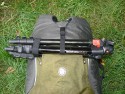 CRUMPLER ZOOMIVERSE XL\n\nFotos und Text von Reinhard Latzke - VIELEN DANK!\n\nKommentar:\n\nHallo\n\nhabe meinen Crumpler Zoomiverse XL  auch gerade bekommen. bin total happy. \n\nes fehlen infos fuer die stativbefestigung bei den 2 fotoserien fuer dieses modell\n\nhinten  mitte bis oben sind 2 laengsreissverschluesse, in dieser oeffenung ist ein gummiband mit klettband , und oben innen eine genaehte roehre  durch die man ein stativbein fuehren kann. somit halten auch grosse stative ohne probleme (mein manfrotto passt super) \nmit dem gummiband und der clipschlaufe von oben mitte laesst sich das stativ dann sichern, so dass es nicht aus der halte(roehren)schlaufe gleitet, \ndie beiden reissverschluesse fuer das fach lassen sich dann bis oben hin zuziehen.\n\nhab meinen fuer unter 50  von der Amazon Resterampe geholt (war total unbenutzt)\n \n\nmit freundlichen Gruessen\nReinhard Latzke