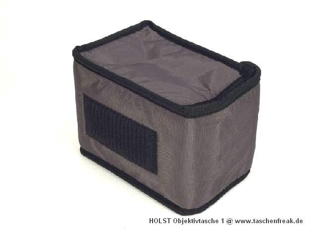 Foto von Hinnerk Holst - VIELEN DANK DAFÜR!\n\nKommentar des Nutzers/Herstellers:\n\nDiese Tasche ist aus 420er Oxford-Nylon und Airmesh mit einer Schaumeinlage gefertigt und lässt sich im Bodenfach der Rucksäcke L und M über Klettbänder befestigen. \n\nFarbe: grau und schwarz \n\nAbmessungen\n\nDiese Tasche ist quaderförmig und nimmt Objektive mit maximal 11 cm Durchmesser und 14 cm Länge sicher auf.