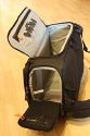 LOWEPRO CLASSIFIED SLING 220 AW\n\nFoto und Kommentar von Oliver Koch - VIELEN DANK!\n\nKommentar:\n\nHallo Jrg,\n\nvielen Dank fr deine tolle Seite, die mir bereits gute Dienste \ngeleistet hat. Nun kann ich auch einmal zur Erweiterung der bersicht \nbeitragen:\n\nIch habe mir den Classified Sling 220 AW gekauft, weil mir zwar das  \nKonzept der Slingshot 300 AW gut gefiel, der Zugriff auf die  \nAusrstung jedoch recht klein war. Auerdem gefiel mir die Anordnung  \nder Unterteilungen beim Slingshot nicht, da ich alle Objektive durch  \ndie seitliche ffnung ereichen wollte.\n\nDie Classified 220 AW kann komplett ausgerumt werden, was eine  \nfreie Einteilung erleichtert und auch eine Nutzung als Daypack  \nermglicht. Bei den Einteilungen gefallen mir besonders die  \nAbdeckungen, die mit einer kleinen orangefarbenen Lasche versehen  \nsind und ermglichen, zwei Objektive bereinander unterzubringen.  \n\nDie Tasche ist stabiler als der Slingshot und hat trotzdem eine  \nwesentlich grere ffnung. Leider ist der Hftgurt nicht  \ngepolstert, dafr lsst er sich aber bei Nichtgebrauch in das  \nRckenteil der Tasche schieben. \n\nNettes Detail sind die Taschen fr  \nSpeicherkarten, die mit einer Anzeige fr leer/voll ausgestattet  \nsind. \n\nDie Stativhalterung ist okay, reicht allerdings bis unter den  \nBoden der Tasche - Absetzen der Tasche mit Stativ drfte also nicht  \nso toll sein...\n\nDas Laptopfach ist recht schmal geraten, die Angabe von LowePro ist  \nda mit 28 cm recht optimistisch ausgefallen - 25 cm habe ich bei mir  \ngemessen.