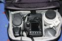 Lowepro Compu Rover AW\n\nFoto von Jrg Langer (www.taschenfreak.de)\n\nKommentar des Nutzers:\n\nDer Compu Rover lste bei uns den Compu Trekker AW ab. Das Innenvolumen ist recht hnlich und die Ausrstung passt gut hinein. Auch das Notebookfach ist extrem gro und hochwertig geschtzt.\n\nWir haben in diesem Beispiel "geladen":\nCanon 5D mit angesetztem 24-70 2.8L\nCanon 17-40\nCanon 70-200 4.0L mit Stativschelle\nCanon 300 4.0L IS mit Stativschelle\nCanon 50 1,8I\nCanon 580 EX\nKenko Pro 1,4TC\n\nAkkus, Akkus fr Blitz, Gorillapod SLR Zoom, Blasebalg, Filtermappe und ggf. Butterbrot und Trinken im Daypack oben.\n\nIn den beiden kleinen Frontaschen geht gut Handy oder PDA und Geldbrse rein.\n\nStativhaltrung ist ausklappbar und trgt auch ein relativ groes Gitzo G1348 recht gut.\n\nDas Tragesystem ist extrem gut und trotz des hohen Gewichts macht es Freude den Rucksacklange zu tragen. Und das auch als groer und "breiter" Nutzer wo andere Fotoruckscke schon zwicken und kneifen.