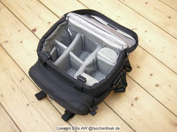 Foto von Ralf Neumann - VIELEN DANK!\n\nKommentar des Nutzers:\n\nLowepro Elite AW\nSehr robuste Tasche fr die kleinere Ausrstung. DSLR mit 4 Objektiven plus Blitz passt prima (meine Sigma SD10 passt auch mit angesetztem Batteriefach wenn ich in die mittleren Fcher kurze Objektive packe).\nWenn die Tasche einen Nachteil hat, ist es die Unterteilung der Vordertasche, die dadurch doch recht eng wird. Viele empfinden dies anders, ich bin jedoch kein Freund von vielen kleinen Fchern. AW steht bei Lowepro fr eine Art Regencape, das in dem rckwrtigen Fach untergebracht ist. Der Deckel lappt ber und schtzt auch ohne das Regencape gut vor Feuchtigkeit. Recht hoher Preis, der jedoch meiner Meinung nach durch die Verarbeitung gerechtfertigt ist. S&F Zubehr kann an den Seiten angesetzt werden.