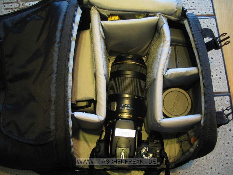 LOWEPRO FASTPACK 200\n\nFoto und Kommentar von Heiko - VIELEN DANK!\n\nKommentar:\n\n\nIch habe mir die Fastpack 200 von Lowepro gekauft, weil mich das schnelle Herausnehmen der Kamera schon bei der Slingshot-Reihe berzeugt hat. Im Laden bemerkte ich, dass ich mit einem Schultergurt nicht zurechtkam.\nDie Fastpack-Reihe hat zwei Schultergurte wie ein richtiger Rucksack, das war fr mich kaufentscheidend.\nIm linken Fach bewahre ich einen Canon Speedlite 430 EX II mit Softbox und ein Canon 70-300 auf. In der Mitte oben habe ich flache Kleinigkeiten wie Filter, Libelle, Fernauslser\nRechts oben habe ich Ladegerte, Akku und Kabel untergebracht.\nRechts unten bewahre ich das Kitobjektiv auf.\nIn der Mitte ist die Kamera mit montiertem Objektiv.