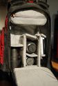 LOWEPRO FLIPSIDE 300\n\nFoto von Werner Hrhann - VIELEN DANK!\n\nKommentar des Nutzers:\n\nHi Jrg,\n \nda ich schon viele Infos von deiner Website gezogen habe, mchte ich auch meinen Beitrag leisten:\n\nLowePro Flipside 300\n\nDie Bilder sind im Anhang, der verpackte Equipment hast du in einem der Bilder dabei.\n\nKommentar:\n\n-> Konzept\nDas Konzept des Flipside hat gegen ber dem des Slingshot 2 riesen Vorteile. Erstens hat man das Gewicht auf beiden Schultern (vollwertiger Rucksack) und wenn man sich die Tasche nach vor dreht hat man die Linsen "nach oben" gerichtet und nicht "nach vorne" wie beim Slingshot (was ja meiner Meinung das System ad absurdum fhrt). Auch der integrierte Stativhalter mit Befestigung ist sehr durchdacht.\n\n-> Gre\nHngt natrlich vom Equipment ab, bei meinem (alle Linsen mit GeLi reingepackt) ist der 300 schon eher am Limit. Das Zubehrfach ist wirklich am untersten Limit designet. Sollte der Platz einmal nicht reichen, dann kann das obere Zubehr Compartment rausgenommen werden.  \n\n-> Verarbeitung\nWie von LowePro gewohnt (ist nun mein 3. Produkt von denen) Top. Zu prfen bleibt die Langzeitstabilitt des "Deckels" und der Bauchgurte\n\n-> Funktion\nWas mir an dem Flipside wirklich taugt ist die "spezielle" Funktion. Man ffnet den (natrlich hhenverstellbaren) Brustgurt, schlpft aus den Schultertrgern raus, und dreht den Rucksack vom Rcken auf den Bauch, die Bauchgurte halten den Rucksack erstaunlich fest. Dann klappt man ihn vom  Krper weg und macht ihn auf (Der Rucksack hat die ffnung nur hinten, somit im Menschengewussel keine Angst mehr vor Diebsthlen). Dann hat man Zugriff auf sein Equipment, und hat, fr mich das beste berhaupt, eine "Arbeitsflche" die mehr als ausreichend Stabilitt gibt fr Linsen- Filterwechsel und Putzaktionen.\n\nFr mich scheint nun die Frage nach einem Daypack beantwortet zu sein, ich kann endlich ohne dass ich meinen Rucksack und eine Linse auf den Boden stellen muss die Objektive wechseln, hab dabei beide Hnde frei und muss nichts in den Dreck legen.\n\nIch habe den Rucksack so gepackt, dass ich alle Linsen an der Kamera haben kann (auf das winzige 50er) und trotzdem noch alles hineinbekomme. Das braucht zwar mehr Platz, aber ich mag nicht immer vorm wegpacken nochmal Linsen wechseln. Leider geht sich das 70-300VR nicht stehend aus, dafr ist das Rucksack ca. 2cm zu wenig tief, wre aber ideal, dann wr noch einiges mehr Platz.\n\nGre aus Wien,\n\nWerner