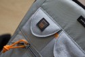 LOWEPRO FLIPSIDE 500\n\nFoto und Text von Lars Brückler - VIELEN DANK!\n\nKommentar:\n\nEs war mal wieder einer dieser Abende wo man eigentlich nichts zu tun hat und einfach so vollkommen unmotiviert im Netz surft. Das kommt zwar nicht oft vor, aber eben doch ab und an.\n\nDas eine oder andere Bierchen war schon geleert, als ich bei Klaus Bothe auf der Seite angelangte und wie jeden Tag die Kleinanzeigen bei Isarfoto checkte. Was sahen meine müden Augen da? Einen Flipside.. was? 500? Das muss doch ein Tippfehler gewesen sein, dachte ich mir. Nun möchte ich behaupten, dass ich mich im Lowepro-Sortiment auskenne, aber von einem Flipside 500 AW habe ich noch nie etwas gehört.\n \nSchon mehrfach hatte ich im Rahmen meiner beruflichen Tätigkeit den Flipside 400 AW in der Hand und habe mich schon oft geärgert, dass dieser außerordentlich gute Rucksack eine Nummer zu klein ist. Aber wenn es etwas nun mal nicht gibt, da nützt auch Fluchen nichts. Schwamm drüber. \n \nDer Blick ging schon wieder Richtung ThinkTankPhoto, denn irgendein Rucksack für das 300er 2.8 L musste her. Immer nur Trolley war nichts und in den Aero 80 passt es zwar rein, aber es steht quasi in einem großen Fach ohne jeglichen Halt. Also Mist! Außerdem passen dann keine anderen Linsen mehr hinein.\n \nNun, ich recherchierte also ein wenig über den 500 AW und siehe da, es gibt ihn wirklich. Es handelt sich bei dem Rucksack um ein limitiertes Sondermodell, welches Lowepro zu den olympischen Winterspielen an Profifotografen (offenbar) verschenkt hatte. Zu kaufen gibt es den Rucksack nicht. Ich habe eine einzige chinesische Seite gefunden, die den Rucksack für schlappe 4083 Hongkong-Dollar vertreibt. Das entspricht in richtigem Geld 406 Euro + Versand und Tax. Das nenne ich mal eine Ansage!\n\nIch bin mittlerweile über den Punkt hinaus, wo ich mir über die Preise von Fotozubehör den Kopf zerbreche, geschweige denn mich darüber aufrege.\n\nInteressant ist, dass LowePro nur 1200 Stück von den Rucksäcken produziert hat. Da stellt sich natürlich die Frage, wie wirtschaftlich so etwas ist. Meiner hat die Nummer 109/1200. Wie toll!\n \nGenug Gelaber, kommen wir zum Rucksack:\n \nErstes Befummeln:\n \nDer erste Eindruck ist wie bei jedem LowePro Produkt erstklassig. Lange habe ich darüber nachgedacht, wer denn nun eigentlich die besseren Produkte macht, LowePro oder Tamrac. Oft ist das Preisniveau sehr ähnlich aber die Verarbeitung geht in den meisten Fällen an LowePro. Diese Erkenntnis manifestiert sich auch im Flipside 500 AW. Die Tasche ist wahnsinnig gut gepolstert und die Größe ist für meine Körperhöhe ideal. Er wirkt auf den ersten Blick nicht zu wuchtig und macht einen hochwertigen Eindruck.\n \nNegatives fiel mir erstmal nicht auf, außer ein NPS Logo, was für mich als Canoniero natürlich ein No-Go ist. Aber das soll mich nicht weiter stören, Patch drüber nähen und gut ist!\n \nAusstattung: \n\nMittlerweile habe ich gelernt, dass es einige wichtige Kriterien gibt, die ein Rucksack erfüllen muss damit er im täglichen Einsatz bestehen kann.\n \nNeben dem Schutz der Ausrüstung sind das vor allem Komfortmerkmale wie ein ordentlich gepolsterter Beckengurt oder breite und weiche Schultergurte. Beides bietet der Flipside 500 AW und hinterlässt somit schonmal einen guten Eindruck. Das modische Äußere ist ebenfalls angenehm, wenngleich es mir lieber gewesen wäre, wenn es den 500 AW in dem sehr schönen Grünton des 400 AW gegeben hätte. Alles Gute ist aber nie beisammen und bei einer Auflage von nur 1200 Stück WELTWEIT ist es wahrscheinlich nicht machbar gewesen auch noch Farbwünsche zu berücksichtigen.\n \nWichtig für mich ist, dass ich mein 13“ MacbookPro immer dabei haben kann. Dies ist im Flipside auf gleich 2 verschiedene Varianten möglich. Zum einen besitzt der Rucksack ein großräumiges Frontfach in welches der Laptop reinpasst. Zum Anderen wäre auch im Innenraum noch Platz für das gute Stück. Wie praktisch letzteres bei der Entnahme der Kamera am Ende noch ist, das mag ich jetzt noch nicht einschätzen.\n\nWie jeder Rucksack von Lowepro ist auch der 500 Aw mit der LowePro - Stativhalterung versehen. Diese erfüllt ihren Zweck, ist aber nicht besonders ansehnlich. Das kann TTP deutlich besser. Dafür hat die LowePro Stativhalterung den großen Vorteil, dass man sie einfach einklappen und hinter einem Verschluss verschwinden lassen kann. Das ist pfiffig und hat sich als sinnvoll herausgestellt.\n \nSollte es von oben mal richtig runter schütten, so ist auch das kein Problem, denn der Rucksack verfügt über ein AW (All Weather) Cover, welches sich schon hundertfach bewährt hat. Ich nehme an, dass da nichts geändert wurde zu allen anderen modernen LowePro - Taschen. Also, bewährte Technik... wieso nicht? Man muss das Rad ja nicht jedes Mal neu erfinden. Besser wäre es jedoch, wenn es abnehmbar wäre. Ich wette aber, dass unzählige Fotografen das Teil dann wieder zuhause vergessen und dann fluchend im Regen stehen ^^ Warum soll es denn anderen besser gehen als mir? Ich denke auch an alles möglich, vergesse aber oftmals das wichtigste (Eintrittskarten, Pass, Jahreskarten etc.)\n \nAuch Kleinigkeiten wie das Visitenkarten-Fach, die Speicherkarten-Fächer usw. sind nett, aber weder außergewöhnlich noch für mich in irgendeiner Weise nutzbar. Auch das kann TTP besser ;-) Aber wenn es schonmal da ist, rausschneiden muss man es ja nicht unbedingt.\n \nDer Innenraum:\n \nMan mag es kaum glauben, aber im Flipside 500 AW hätte sogar eine Linse der Kategorie 400/2.8 L Platz. Das obere Bild zeigt, wieviel Ausrüstung tatsächlich in den Rucksack passt. Ich war sehr erstaunt.\n \nFolgende Ausrüstung findet im Innenraum (ohne Außentaschen) Platz:\n \nCanon EOS 40D Body + BG-E2N\nCanon EOS 550D Body + BG-E8\nSigma 10-20 mm 4-5,6 + Geli\nSigma 18-50 mm 2,8-4,5 + Geli\nCanon 70-200 F4 L USM + Geli\nCanon EF 300 mm 2,8 L USM  mit umgedrehter Geli\nCanon EF Extender 1,4x II\n2x Canon Blitzgerät (580 EX und 420 EX in eigener Hülle)\nSigma Objektiv-Köcher (vom 10-20) mit Ladegeräten etc.\nHama Trackpack mit 16x Eneloop Akku\n\nDas ist schon ganz ordentlich. Sogar alle Ladegeräte (vom MPB, BC700, Canon Ladegeräte für beide Kameras) passen noch in den Innenraum. Das liegt vor allem an der Tiefe des Rucksackes, die groß genug ist, das 70-200er F4 stehend darin zu transportieren. 2 cm weniger und das wäre nicht gegangen. \n\nIn die Außentaschen passen locker jeweils 1 Flasche Wasser mit 1,5 l oder (für diejenigen, die früh duschen und kein Wasser mit rumschleppen müssen :-) ... 2 Flaschen Bier ^^\n\nDie Flipside-Technik:\n \nLaut LowePro soll man in der Lage sein, den Rucksack nach vorn zu drehen und durch den rückseitigen Deckel Zugriff auf die Ausrüstung zu haben. Das mag bei leichten Ausrüstungen klappen, bei meinen 14 kg ohne Getränke und Stativ (mehr Kilos passen ins Hauptfach nicht rein) geht das schon nicht mehr. Ich habe immer Angst, dass es den Beckengurt wegreißt. Was dann das Resultat wäre, dass will ich mir gar nicht ausmalen.\n \nKritikpunkte:\n \nEs gibt natürlich auch Dinge, die mir nicht ganz so gut gefallen. Zum einen ist da die eingeschränkte Farbwahl und die Tatsache, dass man den Rucksack nicht frei kaufen kann. Zum anderen könnte man die Stativ - Halterung noch optimieren. Ich werde mein CT-3442 wohl wieder an der Seite transportieren, wie bei jedem anderen Rucksack auch. Beckengurte sind schön, aber schön wäre es auch, wenn man diese auch abnehmen könnte. Ab und an stören sie dann doch ein wenig aber wenn´s nicht geht... Wurscht!\n \nFazit:\n \nMal wieder ein toller Rucksack, vollgestopft mit tollen Features. Wem der 400er nicht reicht, der wird mit dem 500er AW glücklich. Der hohe Anschaffungswiderstand schreckt ein wenig ab, aber Exklusivität hat eben ihren Preis. Ich habe den Rucksack täglich im Einsatz beim Wandern und auf dem Bike. Bei beiden Einsatzbereichen macht er eine gute Figur und ich würde ihn jederzeit wieder kaufen.\n \nWie viel jeder Einzelne dann am Ende bereit ist zu zahlen, das hängt sicher davon ab, wie gut die eigenen Anforderungen von dem Rucksack erfüllt werden und was einem die Exklusivität wert ist. Letzteres interessiert mich gar nicht aber wenn es nunmal passt, dann kann es auch 2 Euro mehr kosten.\n \nBei Ebay habe ich nicht eine einzige beendete Auktion gefunden, es sollte also nicht leicht werden den LowePro Flipside 500 AW auf dem Gebrauchtmarkt zu finden.