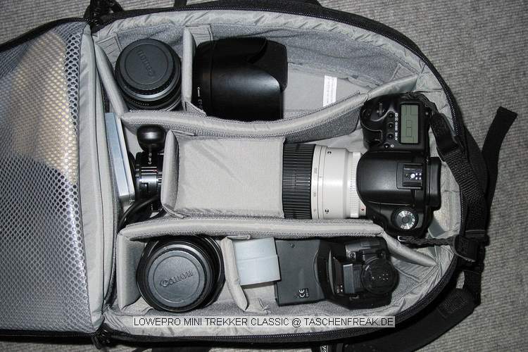 Foto von Juergen Ritter - DANKE DAFÜR !\n\nKommentar des Nutzers:\n\nanbei noch zwei Bilder mit meinem Packvorschlag für den LowePro Minitrekker Classic.\n\nDarin sind zur Zeit:\n\n-10D mit BG\n-50 f1.4\n-70-200 f 2.8\n-17-40 f4\n-Blitz 550 EX mit Omnibounce\n-Kenko 1.5 Konverter\n- Fernauslöser, Filter, Speicherkarten, Akkus, usw. größtenteils in den Netztaschen untergebracht.\n\nDas bestellte 85 1.8 wird dann auch noch seinen Platz im freien Fach finden, sofern es irgendwann mal wieder lieferbar ist.\n\nWichtig war mir, daß ich den Rucksack sowohl mit als auch ohne angesetztem 70-200 unterbringen kann, ohne vorher immer alles umzubauen. \nDaher auch die zwei unterschiedlichen Bilder.