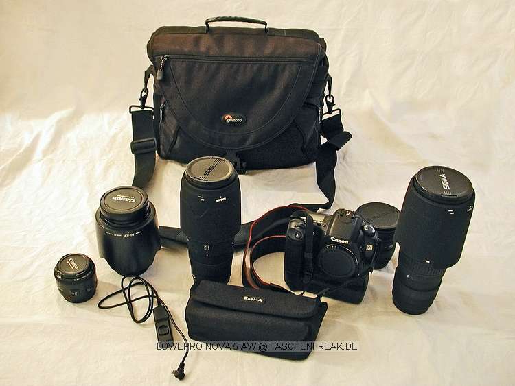 Foto von Oliver Spuhl - DANKE DAF�R !\n\nKommentar des Nutzers:\n�bersicht\nCanon 20D mit BG, Sigma 100-300/4.0, Sigma 180 Makro mit angestztem Konverter 1,4, Sigma 10-20, Canon 50/1.8, Canon 24-70 2.8L, Sigma 500 Super, Fernausl�ser - unsichtbar in Tasche: Graukarte, Diverse Filter