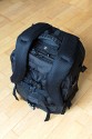 LOWEPRO PRO RUNNER 450 AW\n\nFoto und Text von Sebastian Seth - VIELEN DANK!\n\nKommentar:\n\nier ein kurzer Review zum Lowepro Pro Runner 450 AW:\n \nDer Rucksack ist Lowepro-gewohnt sehr gut verarbeitet und hinterlsst den ersten Eindruck: Sehr leicht und gro!\nDas Tragesystem lsst sich einfach und gut einstellen, sodass der Rucksack auch vollgepackt (!) sehr angenehm zu tragen ist. Der Hftgurt lsst sich hinter dem Rckenpolster verstauen, die Riemen jedoch nicht. Stattdessen kann man diese quasi umkrempeln und auf die Vorderseite ziehen, sodass ein recht kompaktes Format zum Verstauen in Gepckfchern ermglicht wird.\nDie Stativhalterung ist abnehmbar und in zwei verschiedenen Positionen an der Vorderseite oder einer der Seiten ber Sliplock-Schlaufen, die fast berall am Rucksack zu finden sind, befestigen. Fr kompaktere Stative schliet die Halterung so bndig mit dem Rucksack unten ab, sodass dieser noch aufrecht stehen kann. Fr lngere Stative oder ausgedehnte Mrsche kann die Halterung hngend am Rucksack befestigt werden, sodass der Schwerpunkt des Stativs deutlich niedriger ist und weniger Schaukeln des Stativs zu erwarten ist. Fixiert wird das Stativ zustzlich ber drei Gurtschlaufen, von denen zwei am Deckel angebracht sind, der Dritte oben unter dem Griff in einer kleinen Extratasche. Den obersten Gurt muss man allerdings lsen, wenn das Hauptfach geffnet werden soll.\nDas AW-Cover ist auch Lowepro-typisch, ich habe es nicht extra ausgepackt und fotografiert.\nZusatzfcher finden sich auf der Vorderseite (ein kleines und ein groes mit Ordnereinteilung fr Papier und Kleinkram) und an einer Seite (Trinkflaschennetz). Zwischen Hauptfach und Rckenpolsterung ist noch das gut gepolsterte Notebook-Fach. Hier passt tatschlich auch ein groes Notebook rein, getestet sogar das Dell 1720 mit 9-Zellen-Akku.\nInnen im Deckel des Hauptfaches sind verschiedene kleinere Reiverschlusstaschen fr Filter, Akkus, Speicherkarten und sonstiges Zubehr. Die Fcher sind dabei halbtransparent, auf den Bildern sieht man u.a. ein Case fr 77mm Filter durchscheinen.\nDas Hauptfach lsst sich ber die beiliegenden Teiler recht flexibel einrichten und ist ein Platzwunder! Zu Testzwecken habe ich den Rucksack recht locker bepackt mit\nF5 mit angesetztem 28-70mm/3.5-4.5, 300mm/2.8, 80-200mm/2.8, 105mm/2.8, 28-70mm/2.8, 14-24mm/2.8, TC-20E und 16mm/2.8 bereinander, Sb-25, abmontierter Stativhalterung und etwas Zubehr.\nDie Hhe des Faches ist dabei optimal auf Profi-Gehuse bzw. Gehuse mit BG ausgelegt und erlaubt das aufrechte Stellen der meisten Objektive.\n \nAlso rundum ein hervorragender Rucksack fr den Transport mittelgroer bis groer Ausrstungen inklusive (auch greren) Stativen und Full-size Notebook bei sehr gutem Tragekomfort.\n \nSebastian