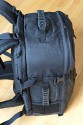 LOWEPRO PRO RUNNER 450 AW\n\nFoto und Text von Sebastian Seth - VIELEN DANK!\n\nKommentar:\n\nier ein kurzer Review zum Lowepro Pro Runner 450 AW:\n \nDer Rucksack ist Lowepro-gewohnt sehr gut verarbeitet und hinterlsst den ersten Eindruck: Sehr leicht und gro!\nDas Tragesystem lsst sich einfach und gut einstellen, sodass der Rucksack auch vollgepackt (!) sehr angenehm zu tragen ist. Der Hftgurt lsst sich hinter dem Rckenpolster verstauen, die Riemen jedoch nicht. Stattdessen kann man diese quasi umkrempeln und auf die Vorderseite ziehen, sodass ein recht kompaktes Format zum Verstauen in Gepckfchern ermglicht wird.\nDie Stativhalterung ist abnehmbar und in zwei verschiedenen Positionen an der Vorderseite oder einer der Seiten ber Sliplock-Schlaufen, die fast berall am Rucksack zu finden sind, befestigen. Fr kompaktere Stative schliet die Halterung so bndig mit dem Rucksack unten ab, sodass dieser noch aufrecht stehen kann. Fr lngere Stative oder ausgedehnte Mrsche kann die Halterung hngend am Rucksack befestigt werden, sodass der Schwerpunkt des Stativs deutlich niedriger ist und weniger Schaukeln des Stativs zu erwarten ist. Fixiert wird das Stativ zustzlich ber drei Gurtschlaufen, von denen zwei am Deckel angebracht sind, der Dritte oben unter dem Griff in einer kleinen Extratasche. Den obersten Gurt muss man allerdings lsen, wenn das Hauptfach geffnet werden soll.\nDas AW-Cover ist auch Lowepro-typisch, ich habe es nicht extra ausgepackt und fotografiert.\nZusatzfcher finden sich auf der Vorderseite (ein kleines und ein groes mit Ordnereinteilung fr Papier und Kleinkram) und an einer Seite (Trinkflaschennetz). Zwischen Hauptfach und Rckenpolsterung ist noch das gut gepolsterte Notebook-Fach. Hier passt tatschlich auch ein groes Notebook rein, getestet sogar das Dell 1720 mit 9-Zellen-Akku.\nInnen im Deckel des Hauptfaches sind verschiedene kleinere Reiverschlusstaschen fr Filter, Akkus, Speicherkarten und sonstiges Zubehr. Die Fcher sind dabei halbtransparent, auf den Bildern sieht man u.a. ein Case fr 77mm Filter durchscheinen.\nDas Hauptfach lsst sich ber die beiliegenden Teiler recht flexibel einrichten und ist ein Platzwunder! Zu Testzwecken habe ich den Rucksack recht locker bepackt mit\nF5 mit angesetztem 28-70mm/3.5-4.5, 300mm/2.8, 80-200mm/2.8, 105mm/2.8, 28-70mm/2.8, 14-24mm/2.8, TC-20E und 16mm/2.8 bereinander, Sb-25, abmontierter Stativhalterung und etwas Zubehr.\nDie Hhe des Faches ist dabei optimal auf Profi-Gehuse bzw. Gehuse mit BG ausgelegt und erlaubt das aufrechte Stellen der meisten Objektive.\n \nAlso rundum ein hervorragender Rucksack fr den Transport mittelgroer bis groer Ausrstungen inklusive (auch greren) Stativen und Full-size Notebook bei sehr gutem Tragekomfort.\n \nSebastian