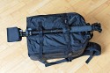 LOWEPRO PRO RUNNER 450 AW\n\nFoto und Text von Sebastian Seth - VIELEN DANK!\n\nKommentar:\n\nier ein kurzer Review zum Lowepro Pro Runner 450 AW:\n \nDer Rucksack ist Lowepro-gewohnt sehr gut verarbeitet und hinterlsst den ersten Eindruck: Sehr leicht und gro!\nDas Tragesystem lsst sich einfach und gut einstellen, sodass der Rucksack auch vollgepackt (!) sehr angenehm zu tragen ist. Der Hftgurt lsst sich hinter dem Rckenpolster verstauen, die Riemen jedoch nicht. Stattdessen kann man diese quasi umkrempeln und auf die Vorderseite ziehen, sodass ein recht kompaktes Format zum Verstauen in Gepckfchern ermglicht wird.\nDie Stativhalterung ist abnehmbar und in zwei verschiedenen Positionen an der Vorderseite oder einer der Seiten ber Sliplock-Schlaufen, die fast berall am Rucksack zu finden sind, befestigen. Fr kompaktere Stative schliet die Halterung so bndig mit dem Rucksack unten ab, sodass dieser noch aufrecht stehen kann. Fr lngere Stative oder ausgedehnte Mrsche kann die Halterung hngend am Rucksack befestigt werden, sodass der Schwerpunkt des Stativs deutlich niedriger ist und weniger Schaukeln des Stativs zu erwarten ist. Fixiert wird das Stativ zustzlich ber drei Gurtschlaufen, von denen zwei am Deckel angebracht sind, der Dritte oben unter dem Griff in einer kleinen Extratasche. Den obersten Gurt muss man allerdings lsen, wenn das Hauptfach geffnet werden soll.\nDas AW-Cover ist auch Lowepro-typisch, ich habe es nicht extra ausgepackt und fotografiert.\nZusatzfcher finden sich auf der Vorderseite (ein kleines und ein groes mit Ordnereinteilung fr Papier und Kleinkram) und an einer Seite (Trinkflaschennetz). Zwischen Hauptfach und Rckenpolsterung ist noch das gut gepolsterte Notebook-Fach. Hier passt tatschlich auch ein groes Notebook rein, getestet sogar das Dell 1720 mit 9-Zellen-Akku.\nInnen im Deckel des Hauptfaches sind verschiedene kleinere Reiverschlusstaschen fr Filter, Akkus, Speicherkarten und sonstiges Zubehr. Die Fcher sind dabei halbtransparent, auf den Bildern sieht man u.a. ein Case fr 77mm Filter durchscheinen.\nDas Hauptfach lsst sich ber die beiliegenden Teiler recht flexibel einrichten und ist ein Platzwunder! Zu Testzwecken habe ich den Rucksack recht locker bepackt mit\nF5 mit angesetztem 28-70mm/3.5-4.5, 300mm/2.8, 80-200mm/2.8, 105mm/2.8, 28-70mm/2.8, 14-24mm/2.8, TC-20E und 16mm/2.8 bereinander, Sb-25, abmontierter Stativhalterung und etwas Zubehr.\nDie Hhe des Faches ist dabei optimal auf Profi-Gehuse bzw. Gehuse mit BG ausgelegt und erlaubt das aufrechte Stellen der meisten Objektive.\n \nAlso rundum ein hervorragender Rucksack fr den Transport mittelgroer bis groer Ausrstungen inklusive (auch greren) Stativen und Full-size Notebook bei sehr gutem Tragekomfort.\n \nSebastian