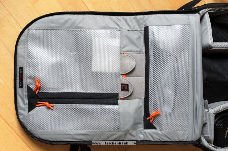 LOWEPRO PRO RUNNER 450 AW\n\nFoto und Text von Sebastian Seth - VIELEN DANK!\n\nKommentar:\n\nier ein kurzer Review zum Lowepro Pro Runner 450 AW:\n \nDer Rucksack ist Lowepro-gewohnt sehr gut verarbeitet und hinterlsst den ersten Eindruck: Sehr leicht und gro!\nDas Tragesystem lsst sich einfach und gut einstellen, sodass der Rucksack auch vollgepackt (!) sehr angenehm zu tragen ist. Der Hftgurt lsst sich hinter dem Rckenpolster verstauen, die Riemen jedoch nicht. Stattdessen kann man diese quasi umkrempeln und auf die Vorderseite ziehen, sodass ein recht kompaktes Format zum Verstauen in Gepckfchern ermglicht wird.\nDie Stativhalterung ist abnehmbar und in zwei verschiedenen Positionen an der Vorderseite oder einer der Seiten ber Sliplock-Schlaufen, die fast berall am Rucksack zu finden sind, befestigen. Fr kompaktere Stative schliet die Halterung so bndig mit dem Rucksack unten ab, sodass dieser noch aufrecht stehen kann. Fr lngere Stative oder ausgedehnte Mrsche kann die Halterung hngend am Rucksack befestigt werden, sodass der Schwerpunkt des Stativs deutlich niedriger ist und weniger Schaukeln des Stativs zu erwarten ist. Fixiert wird das Stativ zustzlich ber drei Gurtschlaufen, von denen zwei am Deckel angebracht sind, der Dritte oben unter dem Griff in einer kleinen Extratasche. Den obersten Gurt muss man allerdings lsen, wenn das Hauptfach geffnet werden soll.\nDas AW-Cover ist auch Lowepro-typisch, ich habe es nicht extra ausgepackt und fotografiert.\nZusatzfcher finden sich auf der Vorderseite (ein kleines und ein groes mit Ordnereinteilung fr Papier und Kleinkram) und an einer Seite (Trinkflaschennetz). Zwischen Hauptfach und Rckenpolsterung ist noch das gut gepolsterte Notebook-Fach. Hier passt tatschlich auch ein groes Notebook rein, getestet sogar das Dell 1720 mit 9-Zellen-Akku.\nInnen im Deckel des Hauptfaches sind verschiedene kleinere Reiverschlusstaschen fr Filter, Akkus, Speicherkarten und sonstiges Zubehr. Die Fcher sind dabei halbtransparent, auf den Bildern sieht man u.a. ein Case fr 77mm Filter durchscheinen.\nDas Hauptfach lsst sich ber die beiliegenden Teiler recht flexibel einrichten und ist ein Platzwunder! Zu Testzwecken habe ich den Rucksack recht locker bepackt mit\nF5 mit angesetztem 28-70mm/3.5-4.5, 300mm/2.8, 80-200mm/2.8, 105mm/2.8, 28-70mm/2.8, 14-24mm/2.8, TC-20E und 16mm/2.8 bereinander, Sb-25, abmontierter Stativhalterung und etwas Zubehr.\nDie Hhe des Faches ist dabei optimal auf Profi-Gehuse bzw. Gehuse mit BG ausgelegt und erlaubt das aufrechte Stellen der meisten Objektive.\n \nAlso rundum ein hervorragender Rucksack fr den Transport mittelgroer bis groer Ausrstungen inklusive (auch greren) Stativen und Full-size Notebook bei sehr gutem Tragekomfort.\n \nSebastian