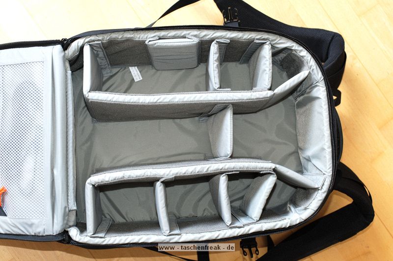 LOWEPRO PRO RUNNER 450 AW\n\nFoto und Text von Sebastian Seth - VIELEN DANK!\n\nKommentar:\n\nier ein kurzer Review zum Lowepro Pro Runner 450 AW:\n \nDer Rucksack ist Lowepro-gewohnt sehr gut verarbeitet und hinterlsst den ersten Eindruck: Sehr leicht und gro!\nDas Tragesystem lsst sich einfach und gut einstellen, sodass der Rucksack auch vollgepackt (!) sehr angenehm zu tragen ist. Der Hftgurt lsst sich hinter dem Rckenpolster verstauen, die Riemen jedoch nicht. Stattdessen kann man diese quasi umkrempeln und auf die Vorderseite ziehen, sodass ein recht kompaktes Format zum Verstauen in Gepckfchern ermglicht wird.\nDie Stativhalterung ist abnehmbar und in zwei verschiedenen Positionen an der Vorderseite oder einer der Seiten ber Sliplock-Schlaufen, die fast berall am Rucksack zu finden sind, befestigen. Fr kompaktere Stative schliet die Halterung so bndig mit dem Rucksack unten ab, sodass dieser noch aufrecht stehen kann. Fr lngere Stative oder ausgedehnte Mrsche kann die Halterung hngend am Rucksack befestigt werden, sodass der Schwerpunkt des Stativs deutlich niedriger ist und weniger Schaukeln des Stativs zu erwarten ist. Fixiert wird das Stativ zustzlich ber drei Gurtschlaufen, von denen zwei am Deckel angebracht sind, der Dritte oben unter dem Griff in einer kleinen Extratasche. Den obersten Gurt muss man allerdings lsen, wenn das Hauptfach geffnet werden soll.\nDas AW-Cover ist auch Lowepro-typisch, ich habe es nicht extra ausgepackt und fotografiert.\nZusatzfcher finden sich auf der Vorderseite (ein kleines und ein groes mit Ordnereinteilung fr Papier und Kleinkram) und an einer Seite (Trinkflaschennetz). Zwischen Hauptfach und Rckenpolsterung ist noch das gut gepolsterte Notebook-Fach. Hier passt tatschlich auch ein groes Notebook rein, getestet sogar das Dell 1720 mit 9-Zellen-Akku.\nInnen im Deckel des Hauptfaches sind verschiedene kleinere Reiverschlusstaschen fr Filter, Akkus, Speicherkarten und sonstiges Zubehr. Die Fcher sind dabei halbtransparent, auf den Bildern sieht man u.a. ein Case fr 77mm Filter durchscheinen.\nDas Hauptfach lsst sich ber die beiliegenden Teiler recht flexibel einrichten und ist ein Platzwunder! Zu Testzwecken habe ich den Rucksack recht locker bepackt mit\nF5 mit angesetztem 28-70mm/3.5-4.5, 300mm/2.8, 80-200mm/2.8, 105mm/2.8, 28-70mm/2.8, 14-24mm/2.8, TC-20E und 16mm/2.8 bereinander, Sb-25, abmontierter Stativhalterung und etwas Zubehr.\nDie Hhe des Faches ist dabei optimal auf Profi-Gehuse bzw. Gehuse mit BG ausgelegt und erlaubt das aufrechte Stellen der meisten Objektive.\n \nAlso rundum ein hervorragender Rucksack fr den Transport mittelgroer bis groer Ausrstungen inklusive (auch greren) Stativen und Full-size Notebook bei sehr gutem Tragekomfort.\n \nSebastian