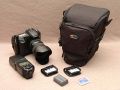 LOWEPRO TOP LOADER 70 AW\n\nFoto von Erik Dabelstein  - VIELEN DANK FR DEIN MAIL!\n\nKommentar des Nutzers:\n\nLowepro Toploader 70 AW\n \nCanon EOS 30D mit Batteriegriff und Handschlaufe mit angesetztem Canon EF 17-40 F4 L USM mit EW-83DII Geli (muss nicht gedreht werden)\nCanon Speedlite 580EX (dank verlngerbarem Frontfach unterbringbar)\nAkkus und Speicherkarte\n \n \nMfG, Erik Dabelstein