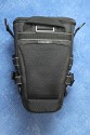 LOWEPRO - TOP LOADER ZOOM AW\n\nFoto von Peter Albrecht - VIELEN DANK!\n\nKommentar:\n\n- gekauft Januar 2009 (scheint auch berarbeitete Version zu sein gegenber dem Model, welches auch auf taschenfreak gezeigt wird)\n  neu: - Reisverschlu innen im Deckel hat jetzt eine Schutzkappe (Bild 06)\n       - SlipLock auf beiden Seiten (Bilder 02 und 04)\n\n- Beigaben:\n  - Schultergurt (Bild 05)\n  - Chest Harness (4 Kunststoffhaken) (Bild 05)\n      - Chest Harness, den man als extra Zubehr erwerben kann hat fr die oberen Ringe zwei Metallhaken\n      - Gurte lassen sich schnell und einfach verstellen\n      - keine Anleitung => erst mal experimentieren, aber man kriegs relativ schnell hin\n  - klitzekleine Anleitung fr die Tasche selbst (englisch / franzsisch / kein Deutsch)\n  - Werbeschild 30 Jahre Lowepro (ist dann wohl schon etwas lter) (Bild 01)\n\n- Innenraum mit 4 Trennern veriabel gestaltbar (Bilder 05, 07, 08 und 09)\n- beim 18-55mm Objektiv kann man problemlos das Ladegert fr die Akkus unter einem doppelten Boden verstauen (Bild 09)\n- die zwei groen Trenner haben noch seitliche Taschen fr Kleinzeugs (z.B. Akkus) (Bilder 05 und 08)\n- Zwei SlipLock Schlaufen (je eine links und rechts) (Bilder 02 und 04)\n- die oberen zwei Ringe zur Befestigung des Tragesystems sind aus Metall, die unteren aus Kunststoff, aber die sind ja nicht so wichtig.\n\n- Was geht rein?\n  - Canon 500D mit Batteriegriff und Tragegurt (Bild 06)\n  - Speedlite 430 EX II + Ersatzakkus + Zweitakku fr Camera (Bild 08)\n  - Ladegert (Bild 09)\n  - Zettel und Speicherkarte (Bild 10)\n  - Anleitungen fr Speedlite und 500D, Stifte, Taschenlampe (Bild 11)\n  - Mignon-Halter fr den Batteriegriff - aber UNGEPOLSTERT! (Bild 12)\n\n\n- All-Weather-Cover (AWC): (Bilder 13 - 16)\n  - Ringe und Gurtschlaufe fr Tragesysteme bleiben frei\n  - Deckel, Fronttasche, Seitentasche sind eingepackt (kein Zugang)\n  - SlipLock auch bei AWC verwendbar\n  - Tragsystem mu vor dem Aufziehen des AWC nicht entfernt werden\n  - Seite am Krper und die Hlfte der linken/rechten Seite (Sliplock) bleiben frei\n  - AWC ber langes Band fest mit Tasche vernht -> kein Verlieren\n\nNegativ:\n- Toploader-Deckel (geschwungen) pat zur Kamera-Form (eher flach) (Bild 17)\n- Blitznase spreitzt sich beim Einlegen an Klettverschlubasis (mit der Zeit lernt man aber, wie mans gut rein bringt)\n- Klettverschlu fr Innenraumteiler aufgenht -> sieht nicht so toll aus und man kann beim Einpacken daran hngen bleiben (EOS 500D) (Bilder 07 und 08)\n- Im Vergleich zum Toploader Pro 70 AW hat der Zoom AW eher ein Plastik-Feeling (besonders die Tasche im Deckel) (Bild 09)\n- Fronttasche garnicht gepolstert -> keine empfindlichen Sachen verstauen\n - im oberen Teil ist das AWC zwischen Tascheninhalt und auen (Bild 11)\n - unten gibts nur ein ungepolstertes Stck Stoff, den Mignon-Halter fr den Batteriegriff sollte man da NICHT transportiern (Bild 12)