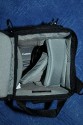 LOWEPRO TOPLOADER PRO 70 AW\n\nFoto und Text von Peter Albrecht - VIELEN DANK!\n\nKommentar:\n\n- gekauft Januar 2009 (vermutlich der Nachfolger des "Toploader 70 AW" - ohne "Pro")\n  - Unterschied zum "ohne Pro": \n     - Deckel klappt jetzt nach links weg anstatt nach vorne.\n     - hat nur noch auf einer Seite (links) Sliplock-Erweiterungsmglichkeit\n     - statt der Sliplock rechts, gibts jetzt eine Auentasche, die mit Gummi oben "gesichert" ist\n		- es gibt aber (Stand Januar 2009) auch noch den "ohne Pro" frs gleiche Geld im Internet\n\n- Beigaben:\n  - Dreipunkt Gurt zum tragen (Bild 01)\n  - klitzekleine deutsche Anleitung\n  - Werbeschild 40 Jahre Lowepro (mte der Aktuelle Stand sein)\n\n- Camera (500D) sitzt fest in der Tasche\n- Innenraum mit 2 Trennern verstellbar (Bilder 09, 10 und 11)\n- bleibt grundsttzlich sogar aufrecht stehen (ist aber nicht besonders stabil, besser hinlegen)\n- Karabiner des Schultergurtes aus Metall\n- mit ein bichen Gefummel, kann man auch die Cameratasche fr die PowerShot in der SlingShot Schlaufe einhngen (Bild 18)\n- Schnellverschlu (keine Reisverschlsse notwendig, um nur die Kamera zu halten)\n- Cameragurt kann man entweder mit in die Tasche rein packen (Bilder 07 und 08), oder raus hngen lassen und ggf in die \n Auentasche packen (Bilder 05 und 06).\n\n- Was pat rein? (Bild 16)\n  - Canon 500D mit Batteriegriff und Tragegurt (Bilder 05 und 07)\n  - Ladegert (unter doppeltem Boden) (Bild 12)\n  - Mignon-Halter fr den Batteriegriff (Bild 13)     - \n  - Speedlite 430 EX II + Zweitakku fr Camera (Bild 14)\n  - Zettel, Speicherkarte, Blitz Ersatzakkus, Anleitungen fr Speedlite und 500D  (Bild 15)\n  - Stifte (Bild 17)\n  - (PowerShot, aber ungepolster) (Bild 17)\n\n- All-Weather-Cover (AWC): (Bilder 20 bis 23)\n  - Ringe und Gurtschlaufe fr Tragesysteme bleiben frei\n  - Deckel lt sich ffnen (wrd ich bei strmenden Regen nicht machen)\n  - Fronttasche, Seitentasche sind zugepackt (kein Zugang)\n  - SlipLock und AWC sind NICHT gleichzeitig verwendbar\n  - Tragsystem mu vor dem Aufziehen des AWC entfernt werden\n  - Nur die Seite am Krper bleibt frei\n  - AWC ber langes Band fest mit Tasche vernht -> kein Verlieren\n\nNegativ:\n- Anleitung fr Schultertragegurt fehlt. (siehe http://www.lowepro-deutschland.de/videos/flvplayer/video_toploader.html)\n- nur eine Sliplock Schlaufe (linke Seite vom Krper aus gesehen)\n- beim Tragen am 3-Punkt-Gurt ist der Toploader bei den ersten Versuchen dem linken Arm im Weg. Vielleicht findet sich durch etwas experimentieren eine bessere Position.\n\nKombination mit dem "Lowepro Chest Harness" ist nicht bequem!\n- Da der Toploader-Deckel nach links aufgeht, sind die oberen Ringe frs Tragesystem sehr nah am Krper; \n Beim Tragen am Chest Harness kippt der obere Teil der Tasche dadurch nach vorne weg, da das Tragesystem keinen\n Zug zum Kper hin erzeugen kann. Dies wiederum resultiert darin, da die untere Kante der Tasche in den \n Bauch drckt, anstatt da das ganze Rckenteil der Tasche flach aufliegt. Dadurch ist das Tragen am Chest\n Harness nicht ganz so bequem. (Der "Toploader Zoom AW" z.B. schmiegt mit dem Chest Harness viel angenehmer \n an den Brustkorb)\n- Besser: Toploader mit kleinen Karabinern an einem Rucksack festmachen. (Bild 19). Vielleicht ist auch der \n "Tamrac S-500 Chest Harness System" geeignet. Auf dem Produktbild sieht es jedenfalls so aus.