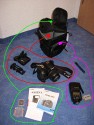 LOWEPRO TOPLOADER PRO 70 AW\n\nFoto und Text von Peter Albrecht - VIELEN DANK!\n\nKommentar:\n\n- gekauft Januar 2009 (vermutlich der Nachfolger des "Toploader 70 AW" - ohne "Pro")\n  - Unterschied zum "ohne Pro": \n     - Deckel klappt jetzt nach links weg anstatt nach vorne.\n     - hat nur noch auf einer Seite (links) Sliplock-Erweiterungsmglichkeit\n     - statt der Sliplock rechts, gibts jetzt eine Auentasche, die mit Gummi oben "gesichert" ist\n		- es gibt aber (Stand Januar 2009) auch noch den "ohne Pro" frs gleiche Geld im Internet\n\n- Beigaben:\n  - Dreipunkt Gurt zum tragen (Bild 01)\n  - klitzekleine deutsche Anleitung\n  - Werbeschild 40 Jahre Lowepro (mte der Aktuelle Stand sein)\n\n- Camera (500D) sitzt fest in der Tasche\n- Innenraum mit 2 Trennern verstellbar (Bilder 09, 10 und 11)\n- bleibt grundsttzlich sogar aufrecht stehen (ist aber nicht besonders stabil, besser hinlegen)\n- Karabiner des Schultergurtes aus Metall\n- mit ein bichen Gefummel, kann man auch die Cameratasche fr die PowerShot in der SlingShot Schlaufe einhngen (Bild 18)\n- Schnellverschlu (keine Reisverschlsse notwendig, um nur die Kamera zu halten)\n- Cameragurt kann man entweder mit in die Tasche rein packen (Bilder 07 und 08), oder raus hngen lassen und ggf in die \n Auentasche packen (Bilder 05 und 06).\n\n- Was pat rein? (Bild 16)\n  - Canon 500D mit Batteriegriff und Tragegurt (Bilder 05 und 07)\n  - Ladegert (unter doppeltem Boden) (Bild 12)\n  - Mignon-Halter fr den Batteriegriff (Bild 13)     - \n  - Speedlite 430 EX II + Zweitakku fr Camera (Bild 14)\n  - Zettel, Speicherkarte, Blitz Ersatzakkus, Anleitungen fr Speedlite und 500D  (Bild 15)\n  - Stifte (Bild 17)\n  - (PowerShot, aber ungepolster) (Bild 17)\n\n- All-Weather-Cover (AWC): (Bilder 20 bis 23)\n  - Ringe und Gurtschlaufe fr Tragesysteme bleiben frei\n  - Deckel lt sich ffnen (wrd ich bei strmenden Regen nicht machen)\n  - Fronttasche, Seitentasche sind zugepackt (kein Zugang)\n  - SlipLock und AWC sind NICHT gleichzeitig verwendbar\n  - Tragsystem mu vor dem Aufziehen des AWC entfernt werden\n  - Nur die Seite am Krper bleibt frei\n  - AWC ber langes Band fest mit Tasche vernht -> kein Verlieren\n\nNegativ:\n- Anleitung fr Schultertragegurt fehlt. (siehe http://www.lowepro-deutschland.de/videos/flvplayer/video_toploader.html)\n- nur eine Sliplock Schlaufe (linke Seite vom Krper aus gesehen)\n- beim Tragen am 3-Punkt-Gurt ist der Toploader bei den ersten Versuchen dem linken Arm im Weg. Vielleicht findet sich durch etwas experimentieren eine bessere Position.\n\nKombination mit dem "Lowepro Chest Harness" ist nicht bequem!\n- Da der Toploader-Deckel nach links aufgeht, sind die oberen Ringe frs Tragesystem sehr nah am Krper; \n Beim Tragen am Chest Harness kippt der obere Teil der Tasche dadurch nach vorne weg, da das Tragesystem keinen\n Zug zum Kper hin erzeugen kann. Dies wiederum resultiert darin, da die untere Kante der Tasche in den \n Bauch drckt, anstatt da das ganze Rckenteil der Tasche flach aufliegt. Dadurch ist das Tragen am Chest\n Harness nicht ganz so bequem. (Der "Toploader Zoom AW" z.B. schmiegt mit dem Chest Harness viel angenehmer \n an den Brustkorb)\n- Besser: Toploader mit kleinen Karabinern an einem Rucksack festmachen. (Bild 19). Vielleicht ist auch der \n "Tamrac S-500 Chest Harness System" geeignet. Auf dem Produktbild sieht es jedenfalls so aus.