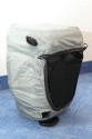 LOWEPRO TOPLOADER PRO 70 AW\n\nFoto und Text von Peter Albrecht - VIELEN DANK!\n\nKommentar:\n\n- gekauft Januar 2009 (vermutlich der Nachfolger des "Toploader 70 AW" - ohne "Pro")\n  - Unterschied zum "ohne Pro": \n     - Deckel klappt jetzt nach links weg anstatt nach vorne.\n     - hat nur noch auf einer Seite (links) Sliplock-Erweiterungsmglichkeit\n     - statt der Sliplock rechts, gibts jetzt eine Auentasche, die mit Gummi oben "gesichert" ist\n		- es gibt aber (Stand Januar 2009) auch noch den "ohne Pro" frs gleiche Geld im Internet\n\n- Beigaben:\n  - Dreipunkt Gurt zum tragen (Bild 01)\n  - klitzekleine deutsche Anleitung\n  - Werbeschild 40 Jahre Lowepro (mte der Aktuelle Stand sein)\n\n- Camera (500D) sitzt fest in der Tasche\n- Innenraum mit 2 Trennern verstellbar (Bilder 09, 10 und 11)\n- bleibt grundsttzlich sogar aufrecht stehen (ist aber nicht besonders stabil, besser hinlegen)\n- Karabiner des Schultergurtes aus Metall\n- mit ein bichen Gefummel, kann man auch die Cameratasche fr die PowerShot in der SlingShot Schlaufe einhngen (Bild 18)\n- Schnellverschlu (keine Reisverschlsse notwendig, um nur die Kamera zu halten)\n- Cameragurt kann man entweder mit in die Tasche rein packen (Bilder 07 und 08), oder raus hngen lassen und ggf in die \n Auentasche packen (Bilder 05 und 06).\n\n- Was pat rein? (Bild 16)\n  - Canon 500D mit Batteriegriff und Tragegurt (Bilder 05 und 07)\n  - Ladegert (unter doppeltem Boden) (Bild 12)\n  - Mignon-Halter fr den Batteriegriff (Bild 13)     - \n  - Speedlite 430 EX II + Zweitakku fr Camera (Bild 14)\n  - Zettel, Speicherkarte, Blitz Ersatzakkus, Anleitungen fr Speedlite und 500D  (Bild 15)\n  - Stifte (Bild 17)\n  - (PowerShot, aber ungepolster) (Bild 17)\n\n- All-Weather-Cover (AWC): (Bilder 20 bis 23)\n  - Ringe und Gurtschlaufe fr Tragesysteme bleiben frei\n  - Deckel lt sich ffnen (wrd ich bei strmenden Regen nicht machen)\n  - Fronttasche, Seitentasche sind zugepackt (kein Zugang)\n  - SlipLock und AWC sind NICHT gleichzeitig verwendbar\n  - Tragsystem mu vor dem Aufziehen des AWC entfernt werden\n  - Nur die Seite am Krper bleibt frei\n  - AWC ber langes Band fest mit Tasche vernht -> kein Verlieren\n\nNegativ:\n- Anleitung fr Schultertragegurt fehlt. (siehe http://www.lowepro-deutschland.de/videos/flvplayer/video_toploader.html)\n- nur eine Sliplock Schlaufe (linke Seite vom Krper aus gesehen)\n- beim Tragen am 3-Punkt-Gurt ist der Toploader bei den ersten Versuchen dem linken Arm im Weg. Vielleicht findet sich durch etwas experimentieren eine bessere Position.\n\nKombination mit dem "Lowepro Chest Harness" ist nicht bequem!\n- Da der Toploader-Deckel nach links aufgeht, sind die oberen Ringe frs Tragesystem sehr nah am Krper; \n Beim Tragen am Chest Harness kippt der obere Teil der Tasche dadurch nach vorne weg, da das Tragesystem keinen\n Zug zum Kper hin erzeugen kann. Dies wiederum resultiert darin, da die untere Kante der Tasche in den \n Bauch drckt, anstatt da das ganze Rckenteil der Tasche flach aufliegt. Dadurch ist das Tragen am Chest\n Harness nicht ganz so bequem. (Der "Toploader Zoom AW" z.B. schmiegt mit dem Chest Harness viel angenehmer \n an den Brustkorb)\n- Besser: Toploader mit kleinen Karabinern an einem Rucksack festmachen. (Bild 19). Vielleicht ist auch der \n "Tamrac S-500 Chest Harness System" geeignet. Auf dem Produktbild sieht es jedenfalls so aus.