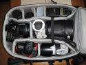 LOWEPRO VERTEX 300 AW\n\nFoto und Text von Michael Wilcynski - VIELEN DANK!\n\nKommentar:\n\nHallo,\n\nanbei einige Fotos von meinen Lowepro Vertex 300  fr die Taschenfreak Galerie.\n\nDer Rucksack Ist mit folgenden Gegenstnden bestckt:\n\nLinke Fronttasche:\n-          SD Karte\n-          2x CF Karten\n-          SDHC / USB Adapter\n-          2 Canon NP E3 Akkus (fr 1D MKII)\n \nRechte Fronttasche:\n-          Kugelschreiber\n-          Handy\n-          Kartenleser (Reiverschlusstasche)\n-          Kabel & Funk Fernauslser (2. Reiverschlusstasche)\n           \nNotebookfach:\n-          Handschuhe + 10 Zoll Netbook bzw. 15 Zoll Notebook\n\nGroes Fach:\n-          2x 580 EX\n-          2x Extender + Bouncer\n-          EF 85 f/1.8 USM inkl. Streulichtblende\n-          1.4x Extender unter Tokina 10-17 Fisheye\n-          EF 300 f/2.8 L IS USM + Polfilter \n-          EOS 5D inkl. BG E4 + angesetztem EF 17-40 L USM und gedrehter Streulichtblende\n-          EF 70-200 L USM\n-          1D MK II\n\nDeckel:\n-          Polfilter 77mm\n-          2x BP 511\n-          1x Satz Ersatzakkus fr 580 EX\n-          Bedienungsanleitung\n \nGru Michael