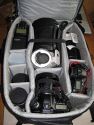 LOWEPRO VERTEX 300 AW\n\nFoto und Text von Michael Wilcynski - VIELEN DANK!\n\nKommentar:\n\nHallo,\n\nanbei einige Fotos von meinen Lowepro Vertex 300  fr die Taschenfreak Galerie.\n\nDer Rucksack Ist mit folgenden Gegenstnden bestckt:\n\nLinke Fronttasche:\n-          SD Karte\n-          2x CF Karten\n-          SDHC / USB Adapter\n-          2 Canon NP E3 Akkus (fr 1D MKII)\n \nRechte Fronttasche:\n-          Kugelschreiber\n-          Handy\n-          Kartenleser (Reiverschlusstasche)\n-          Kabel & Funk Fernauslser (2. Reiverschlusstasche)\n           \nNotebookfach:\n-          Handschuhe + 10 Zoll Netbook bzw. 15 Zoll Notebook\n\nGroes Fach:\n-          2x 580 EX\n-          2x Extender + Bouncer\n-          EF 85 f/1.8 USM inkl. Streulichtblende\n-          1.4x Extender unter Tokina 10-17 Fisheye\n-          EF 300 f/2.8 L IS USM + Polfilter \n-          EOS 5D inkl. BG E4 + angesetztem EF 17-40 L USM und gedrehter Streulichtblende\n-          EF 70-200 L USM\n-          1D MK II\n\nDeckel:\n-          Polfilter 77mm\n-          2x BP 511\n-          1x Satz Ersatzakkus fr 580 EX\n-          Bedienungsanleitung\n \nGru Michael