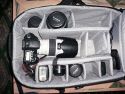 LOWEPRO VERTEX 300 AW\n\nFoto von Stefan Kmmerling - VIELEN DANK FR DEIN MAIL!\n\nKommentar des Nutzers:\n\nHallo Jrg,\n\nAnbei ein paar Bilder von o.g. Rucksack mit der Bitte diese beim Taschenfreak einzustellen. Die fotografische Qualitt der Bilder ist sicher sehr schlecht, aber das war mal wieder eine Aktion zwischen Tr und Angel.\n\nBild 1: Notebookfach mit 14 Zoll Notebook\n\nBild 2: Notebook halb drauen\n\nBild 4-6: Die Tragegurte knnen abgedeckt werden (sehr praktisch beim Fliegen als Handgepck)\n\nBild 7,8: geffnete Vordertaschen\n\nBild 9: Keine Schleichwerbung fr PUR soll nur die Gre des Rucksacks zeigen\n\nBild 12: 30D mit 70-200 2,8 IS +Geli; 28-70 2,8 + Geli; Blitz 430; 17-85 IS (Kit); 85 1,8; 50 1,8 \n\n Liebe Gre\n\nStefan (strike)