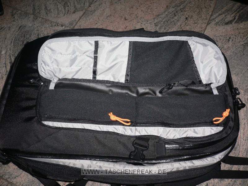LOWEPRO VERTEX 300 AW\n\nFoto von Stefan Kmmerling - VIELEN DANK FR DEIN MAIL!\n\nKommentar des Nutzers:\n\nHallo Jrg,\n\nAnbei ein paar Bilder von o.g. Rucksack mit der Bitte diese beim Taschenfreak einzustellen. Die fotografische Qualitt der Bilder ist sicher sehr schlecht, aber das war mal wieder eine Aktion zwischen Tr und Angel.\n\nBild 1: Notebookfach mit 14 Zoll Notebook\n\nBild 2: Notebook halb drauen\n\nBild 4-6: Die Tragegurte knnen abgedeckt werden (sehr praktisch beim Fliegen als Handgepck)\n\nBild 7,8: geffnete Vordertaschen\n\nBild 9: Keine Schleichwerbung fr PUR soll nur die Gre des Rucksacks zeigen\n\nBild 12: 30D mit 70-200 2,8 IS +Geli; 28-70 2,8 + Geli; Blitz 430; 17-85 IS (Kit); 85 1,8; 50 1,8 \n\n Liebe Gre\n\nStefan (strike)