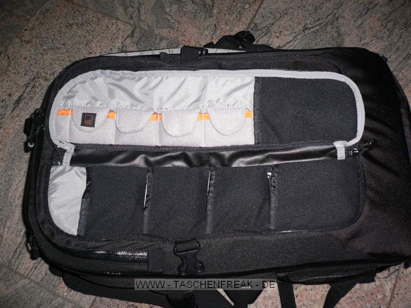 LOWEPRO VERTEX 300 AW\n\nFoto von Stefan Kmmerling - VIELEN DANK FR DEIN MAIL!\n\nKommentar des Nutzers:\n\nHallo Jrg,\n\nAnbei ein paar Bilder von o.g. Rucksack mit der Bitte diese beim Taschenfreak einzustellen. Die fotografische Qualitt der Bilder ist sicher sehr schlecht, aber das war mal wieder eine Aktion zwischen Tr und Angel.\n\nBild 1: Notebookfach mit 14 Zoll Notebook\n\nBild 2: Notebook halb drauen\n\nBild 4-6: Die Tragegurte knnen abgedeckt werden (sehr praktisch beim Fliegen als Handgepck)\n\nBild 7,8: geffnete Vordertaschen\n\nBild 9: Keine Schleichwerbung fr PUR soll nur die Gre des Rucksacks zeigen\n\nBild 12: 30D mit 70-200 2,8 IS +Geli; 28-70 2,8 + Geli; Blitz 430; 17-85 IS (Kit); 85 1,8; 50 1,8 \n\n Liebe Gre\n\nStefan (strike)
