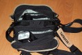 SARFROTTO L100\n\nFoto von Jrg Langer\n\nKommentar/Details zur L100 von Sarfrotto:\n\nSehr hochwertige Profi-Fototasche\nvon Sarfrotto L 100 - All Weather kompatibel\n\nSuper Qualitt zum gnstigen Preis!\n- Sicherheit fr Ihre Kamera, beste Polsterung!\n- Schutz vor Regen, Staub, Schnee!\n- Schneller Zugriff zur Kamera durch einen Rei\nverschluss in der Mitte\n- Lasche zum Durchfhren eines Grtels\n- Sehr Gut gepolsterter Gurt\n- Ideal fr den Profieinsatz\n- Innenpolster herausnehmbar\n- Trennfcher knnen mit Klettverschluss ange-\nordnet werden\n\nBeschreibung\nDiese sehr leichten und hochwertigen Fototaschen sind sehr gut vearbeitet und bieten optimalen Schutz fr Ihre Kameraasurstung - und das bei praktischer und einfacher Handhabung.\n\nBesonders gelungen ist der weiche Gurt, er erlaubt bequemes Tragen der Fotoausrstung. Der in der Mitte der Tasche liegende Reiverschluss ist super, fr den schnellen Zugriff zur Kamera.\nDie Tasche bieten Schutz vor Regen, Staub, Schnee, etc.\n\nDie Tasche ist kompatibel mit den Waistbelts anderer Markenhersteller - die Weistbelts (Hftgrtel) lassen sich ganz einfach durch die Lasche am hinteren Ende der Kamera ziehen.\n\nBei Bedarf kann das gepolsterte Innenfach herausgenommen werden. Die Tasche wird dadurch noch leichter und weicher.\n\nDetails der L 100:\n- Praktischer Tragegriff\n- Seitliche Laschen zum anschlieen von Kchern, o..\n- Gerumige Vordertasche fr Ladegerte, Speicher, Film,\nAkkus, etc.\n- 3 Fcher im gepolsterten Innenfach\n- Gurtschlaufe hinten fr Waistbelts\n- Gepolsterter Gurt\n\nFassungsvermgen: Siehe Details in den Bildern\n\nMae\nInnen: ca. 23x15x15cm\nAuen: ca. 30x16x18cm