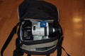 Sarfrotto L300\n\nFoto von Jrg Langer\n\nKommentar/Details:\n\nSehr hochwertige Profi-Fototasche\nvon Sarfrotto L 300 - All Weather kompatibel\n\nSuper Qualitt zum gnstigen Preis!\n- Sicherheit fr Ihre Kamera, beste Polsterung!\n- Komplett variables, gepolstertes Innenfach\n- Schutz vor Regen, Staub, Schnee!\n- Regenhaube zum berstlpen!\n- Schneller Zugriff zur Kamera durch einen Rei-\nverschluss in der Mitte\n- Lasche zum Durchfhren eines Waistbelts\n- Sehr Gut gepolsterter Gurt\n- Ideal fr den Profieinsatz\n- Innenpolster herausnehmbar\n- Trennfcher knnen mit Klettverschluss ange-\nordnet werden\n\nBeschreibung\nDiese sehr leichten und hochwertigen Fototaschen sind sehr gut vearbeitet und bieten optimalen Schutz fr Ihre Kameraasurstung - und das bei praktischer und einfacher Handhabung.\n\nBesonders gelungen ist der weiche Gurt, er erlaubt bequemes Tragen der Fotoausrstung. Der in der Mitte der Tasche liegende Reiverschluss ist super, fr den schnellen Zugriff zur Kamera.\nDie Tasche bieten Schutz vor Regen, Staub, Schnee, etc.\n\nDie Tasche ist kompatibel mit den Waistbelts anderer Markenhersteller - die Weistbelts (Hftgrtel) lassen sich ganz einfach durch die Lasche am hinteren Ende der Kamera ziehen.\n\nBei Bedarf kann das gepolsterte Innenfach herausgenommen werden. Die Tasche wird dadurch noch leichter und weicher.\n\nRegencover\n\nDetails der L 300:\n- Praktischer Tragegriff\n- Seitliche Laschen zum anschlieen von Kchern, o..\nMit Festzurrschlaufe zum fixieren der Kcher!\n- Gerumige Vordertasche fr Ladegerte, Speicher, Film,\nAkkus, etc. - eingeteilt in versch. Fcher.\n- Herausnehmbare Regenhaube fr noch mehr Schutz\n- variable Fcher im gepolsterten Innenfach\n- 2x Innenliegendes Geheimfach hinter der Polsterung\n- Gurtschlaufe hinten fr Waistbelts\n- Bequemer, gepolsterter Gurt\n\nFassungsvermgen:\nSiehe Inhalt der Detailbilder\n\nMae\nInnen: ca. 28x17,5x20cm\nAuen: ca. 35x20x25cm