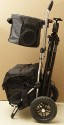 TROLLEY SELBSTBAU\n\nFoto von Ingo Cordes - VIELEN DANK!\n\nKommentar des Nutzers:\n\nDas Grundgestell ist ein Andersen Royal Plus Shopper. Am Griff oben ist zustzlich eine kleine Metallplatte angenietet. Durch die Luftreifen ist ein Einsatz auf Wanderwegen etc. problemlos mglich. \n \nAls Stativhalterung nutze ich unten einen Lowepro Stativhalter. Zur Befestigung oben am Shopper ist ein Klick-Fix Halter an der Wechselplatte angeschraubt. Vorteil ist, dass man die fr diverse Stativkpfe nutzen kann.\n \nZustzlich zur Fototasche ist oben am Shopper eine Klick-Fix Doggy-Transporttasche befestigt. Haupteinsatzzweck ist hier Objektivwechsel (kein Bcken) und Transport der Kamera bei kurzen Strecken (z.B. im Zoo zum nchsten Gehege). Es passt eine Kamera mit aufgesetztem 300er/f4 + TK rein.\n \nDas Ganze ist schnell und einfach zerlegbar/zusammenklappbar.