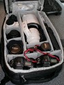 Think Tank Airport Addicted\n\nFoto von einem netten Einsender der ungenannt bleiben mchte - VIELEN DANK!\n\nKommentar des Nutzers:\n\n001: Es werden extrem viele Trennwnde mitgeliefert! Diese Wnde sind bei mir berflssig. Auch ein Regenschutz ist im Lieferumfang dabei (nicht auf Foto).\n002: Das Schnellzugrifffach.\n003: Frontansicht.\n004: Rckansicht mit Tragevorrichtung.\n005: Tragevorrichtung kann hinter einer Trennwand versorgt werden. Es ist dann kein Rucksack mehr sondern eine Tasche.\n006: Tragevorrichtung kann hinter einer Trennwand versorgt werden. Es ist dann kein Rucksack mehr sondern eine Tasche.\n007: Der praktische Seitengriff.\n008: Notebookfach inklusive... (Notebooktasche wird mitgeliefert)\n009: Notebookfach inklusive... (Notebooktasche wird mitgeliefert)\n010: Innenansicht mit Equipment. (Man beachte das 70-200IS, es passt sogar vertikal in die Tasche.)\n011: Innenansicht mit Equipment. (Man beachte das 70-200IS, es passt sogar vertikal in die Tasche.)\n012: Innenansicht ohne Equipment.\n013: Passt alles ohne Probleme in den Airport Addicted.\n\nAuf der Herstellerseite gibt es tolle Bilder und informative PDFs ber den Rucksack...\n\nFazit: empfehlenswert.