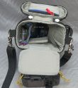 THINK TANK PHOTO - DIGITAL HOLSTER 10\n\nFoto von Wolfgang Rentzsch - VIELEN DANK!\n\nKommentar:\n\nBilder zur Digital Holster 10.\n\nDie Regenhaube nehme ich nie mit. Den Platz nutze ich lieber fr den Ersatzakku. Wenn ich mit Rucksack unterwegs bin, lasse ich den Schultergurt weg und hnge die Holstertasche mit kurzen Reepschnurstcken und kleinen Karabinerchen dran vorne in die Tragegurte ein. Mit der hinteren Klappe fixiere ich die Tasche am Bauchgurt. Auf diese Weise pendelt das ganze Zeug beim Vornberbeugen nicht vor der Nase herum.\n\nViele Gre\n\nWolfgang Rentzsch