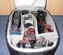 THINK TANK PHOTO - STREET WALKER HARDDRIVE\n\nFoto und Text von Jrg Langer - www.taschenfreak.de\n\nKommentar:\n\nHallo Zusammen,\n\nder neue StreetWalker Hard Drive von den Taschenmachern aus USA ist mein neuer Begleiter geworden. Schon nach wenigen Tagen habe ich Ihn fest in mein groes Taschenherz geschlossen :-).\n\nEr lste bei uns den Lowepro Mini Trekker AW und Lowepro CompuTrekker AW ab.\n\nEr ist in Etwa vergleichweise grpo in den Auenmaen - nur etwas tifer - aber innen ein wahres Packwunder. Auch das Tragegestelle ist deutlich besser als bei den beiden anderen genannten.\n\nWir verstauen darin zwei komplette DSLRs mit groen Objektiven und alles was an Zubehr so "mit muss". Auch die Stativhalterung ist sehr gelungen und in der Praxis super einsetzbar und das egal ob man ein kleines Reisestativ wie das Travel Angel aus dem Hause benro einsetzt oder ein greres und lngeres wie in unserem Falle das Quadro Pod aus dem Hause Novoflex.\n\nIch denke die Bilder zeigen gut die Vielfalt und die Nutzbarkeit dieses Begleiters.\n\nIn wenigen Wochen werde ich diesen Im Flieger nach Dubai testen und sicher einen intensiveren Eindruck vermitteln knnen.\n\nBis dahin - erstmal Prdikat "Taschenfreak empfiehlt als einen der fnf besten Taschen"!\n\nEuer Jrg