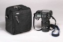 THINK TANK PHOTO - URBAN DISGUISE 10\n\nFOTO VON ISARFOTO & THINK TANK PHOTO - VIELEN DANK!\n\nKommentar des Herstellers:\n\nHolds Lenses or small SLR\n\nThis small but versatile bag can be used to change two lenses, or for a small SLR with a kit lens attached. It is also compatible with our Pro Speed Belt so that it can be used as a Modular component. An SLR without the bottom battery grip attached can also be put into the front expandable pocket without a lens attached.